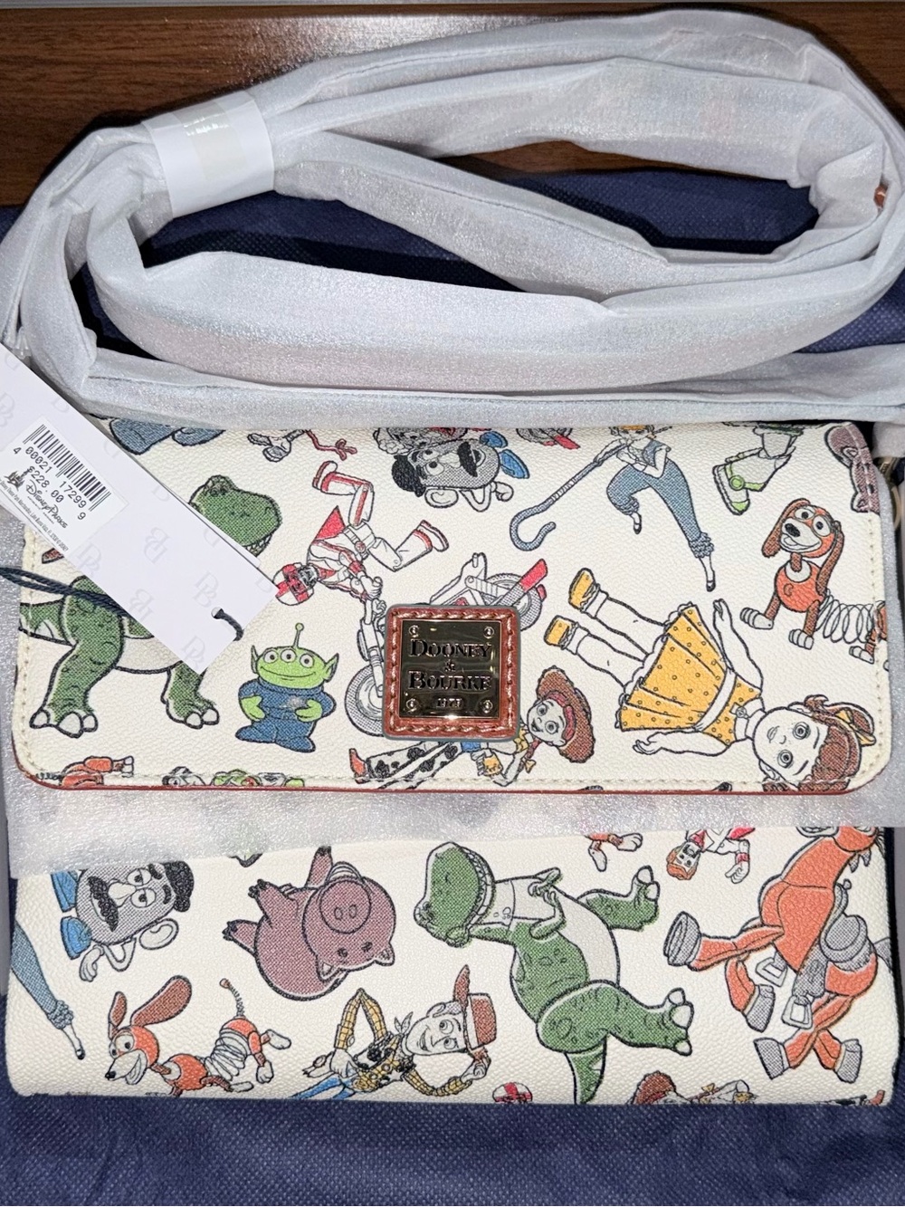 Dooney & Bourke Cream Toy Story Character Print Crossbody